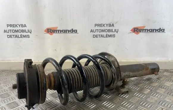 Volkswagen Caddy Front shock absorber with coil spring