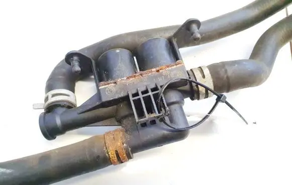 Coolant heater control valve