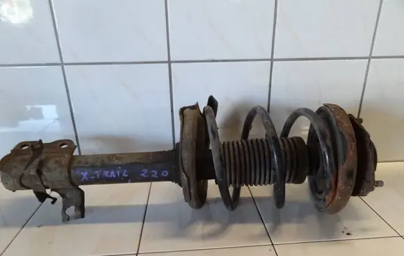 Nissan X-Trail T30 Front shock absorber with coil spring