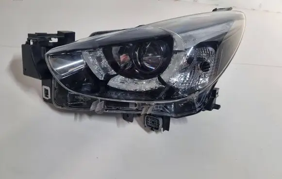 Mazda 2 Headlight/headlamp D09K51040