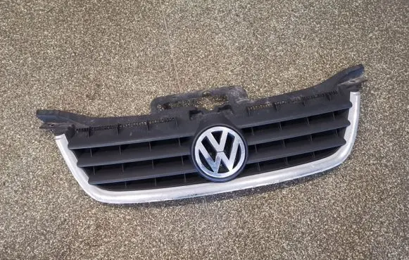 Volkswagen Touran I Front bumper upper radiator grill 1T0853651 1T0853601