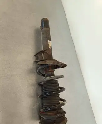Volkswagen Golf VII Front shock absorber with coil spring