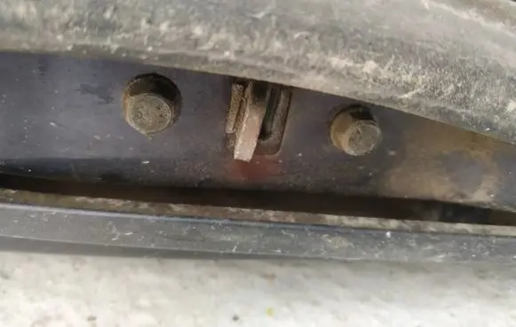 Rear door check strap stopper