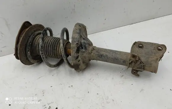 Subaru Legacy Front shock absorber with coil spring