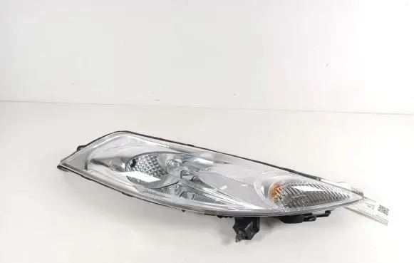 Nissan Juke I F15 Headlight/headlamp