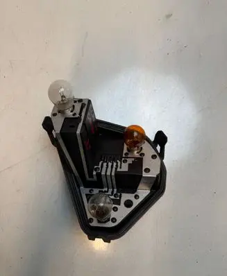 Renault Clio III Tail light bulb cover holder 321312