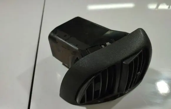 Dash center air vent grill