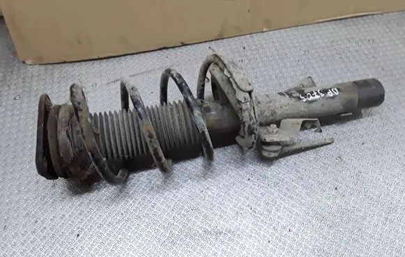 Front shock absorber with coil spring