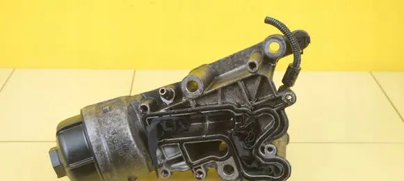 Alfa Romeo Giulietta Oil filter mounting bracket 55235481 940A4000