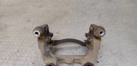 Volkswagen PASSAT B7 Brake caliper pad carrier rear