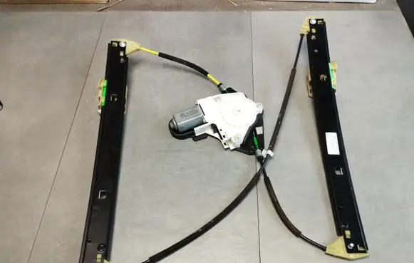 Rear door window regulator with motor