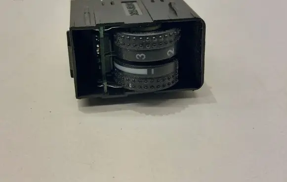Headlight level height control switch