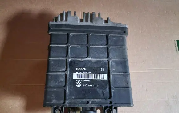 Volkswagen PASSAT B3 Engine control unit/module 1H0907311C