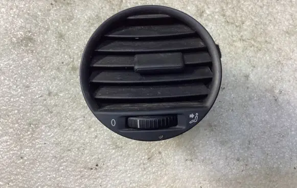 Volkswagen Caddy Dash center air vent grill 2K0819703B