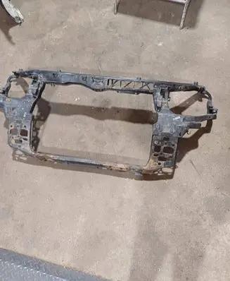 Radiator support slam panel