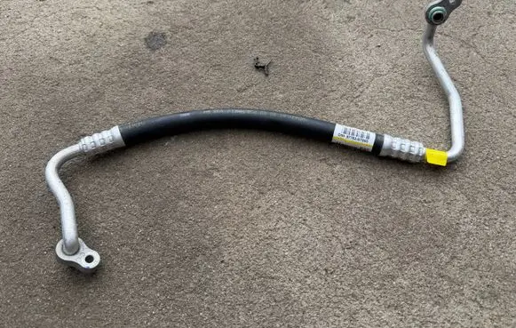 Hyundai Tucson TL Air conditioning (A/C) pipe/hose 97762D7800