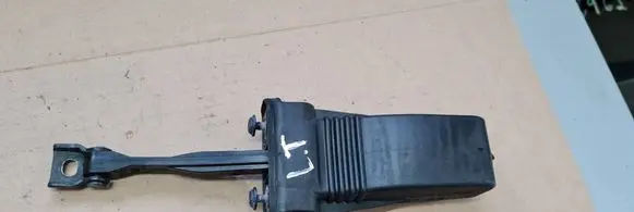 Rear door check strap stopper