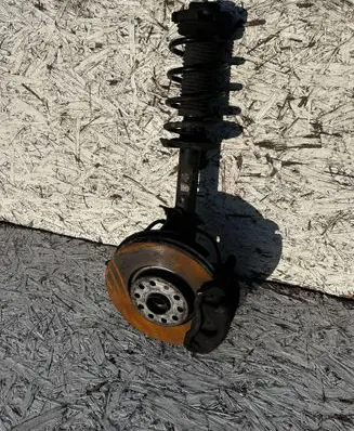 Front wheel hub spindle knuckle