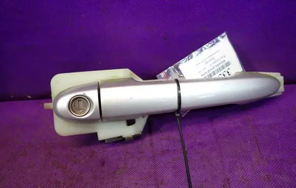 KIA Carens I Front door exterior handle