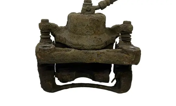 Nissan Juke I F15 Front brake caliper