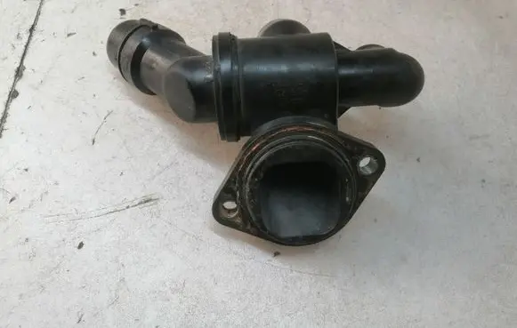 Thermostat/thermostat housing