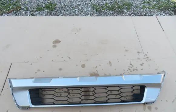 Subaru Outback Front bumper lower grill 57734AN010