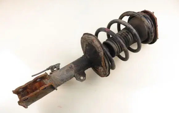 Toyota Corolla E120 E130 Front shock absorber with coil spring 
