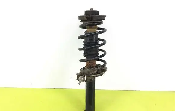 Volkswagen PASSAT B6 Front shock absorber with coil spring