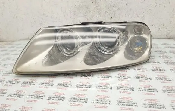 Volkswagen Touareg I Headlight/headlamp 7L6941015BK