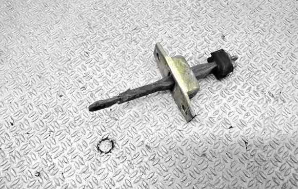 Front door check strap stopper