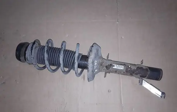 Volkswagen Golf IV Front shock absorber with coil spring 1J04130315