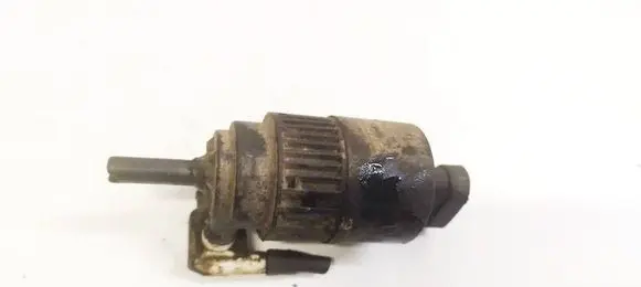 Renault Laguna I Windscreen/windshield washer pump 7700821782