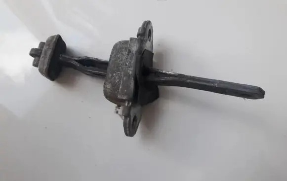 Nissan Sunny Rear door check strap stopper