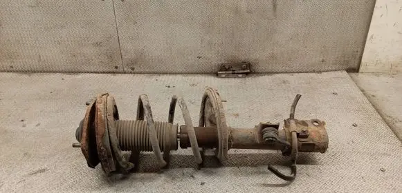 KIA Carens II Front shock absorber with coil spring 
