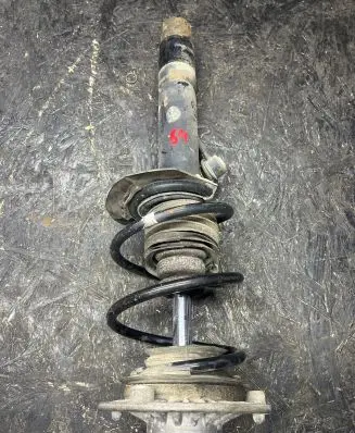 Front shock absorber with coil spring