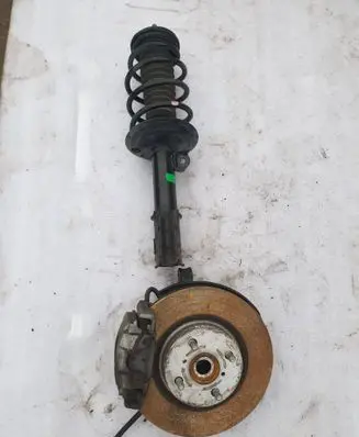 Toyota Yaris Front shock absorber with coil spring 485100DE71 0001100048
