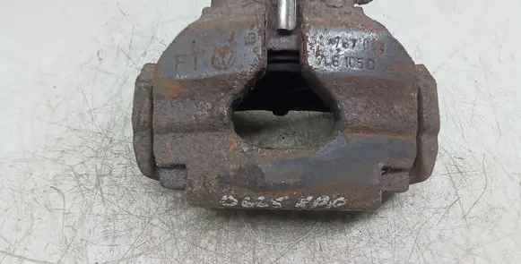 Volkswagen Touareg I Front brake caliper 767 7L6105D