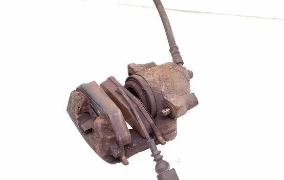 Volkswagen Golf V Front brake caliper