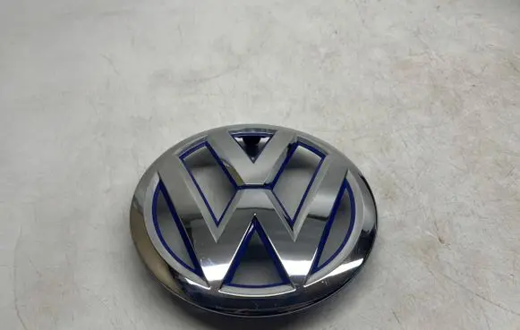 Volkswagen Up Manufacturer badge logo/emblem 12E853601