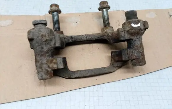 Opel Astra G Brake caliper pad carrier rear 