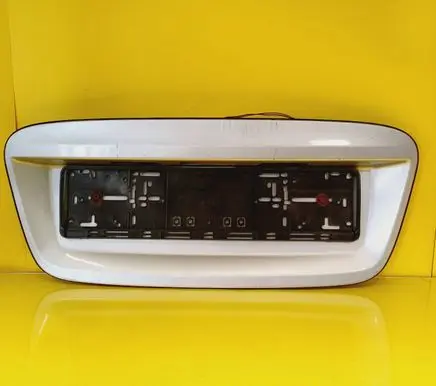 Nissan Almera Tino Trunk door license plate light bar 90810BU 24055BU700