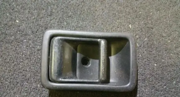Mazda 323 Front door interior handle