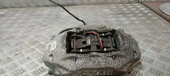 Volkswagen Touareg I Front brake caliper 