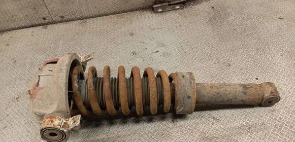 Volkswagen Touareg I Rear shock absorber with coil spring 