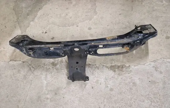 Top upper radiator support slam panel