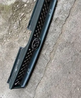Subaru Justy Front bumper upper radiator grill 791112000Z