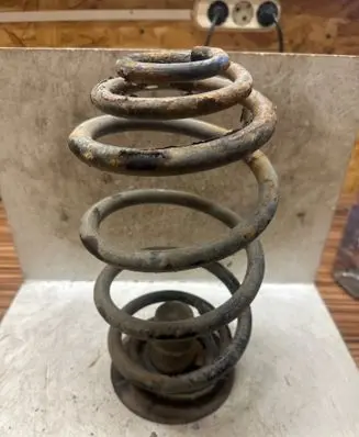 Opel Zafira B Front coil spring 90538498
