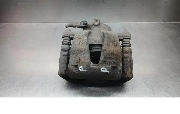 Opel Corsa D Front brake caliper 