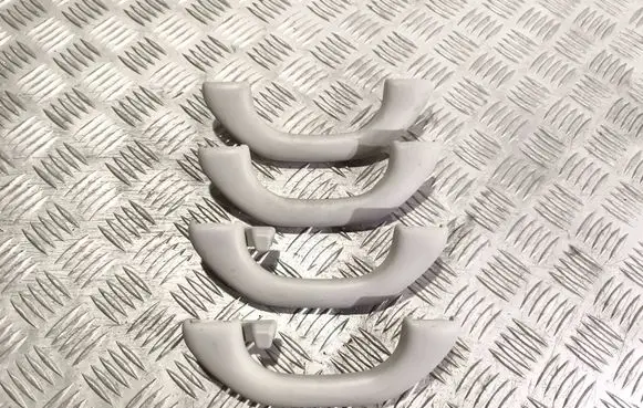 Volkswagen Touran II A set of handles for the ceiling 1K0857607N 1K0857607M