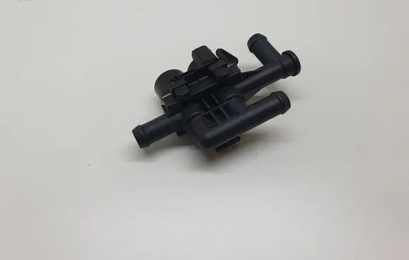 Coolant heater control valve